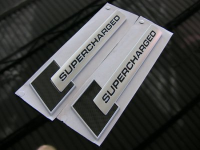 Audi-Supercharged-Badge-Parts-3.jpg